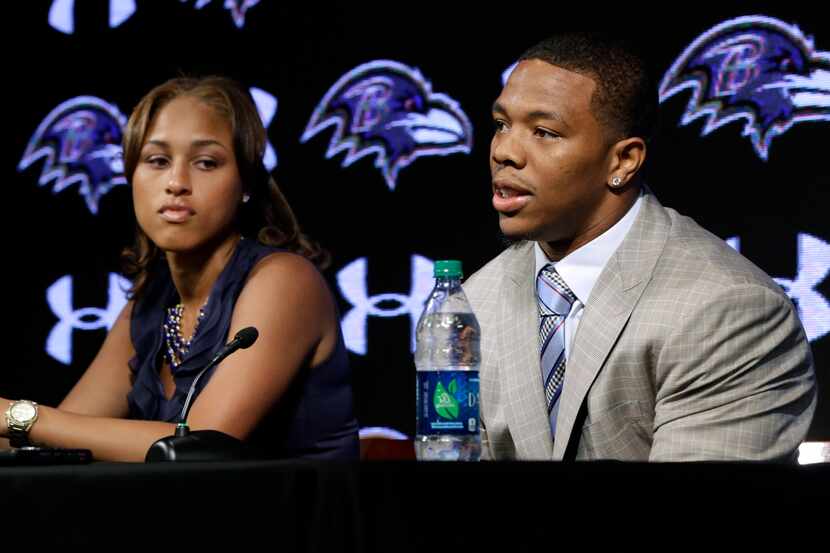 FILE - In this May 23, 2014, file photo, Baltimore Ravens running back Ray Rice, right,...