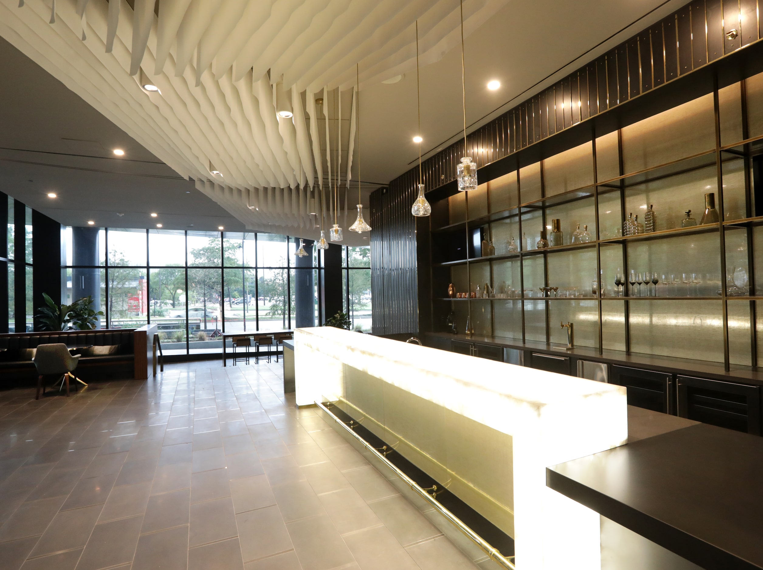 The lobby includes a lighted bar at Amli Fountain Place.