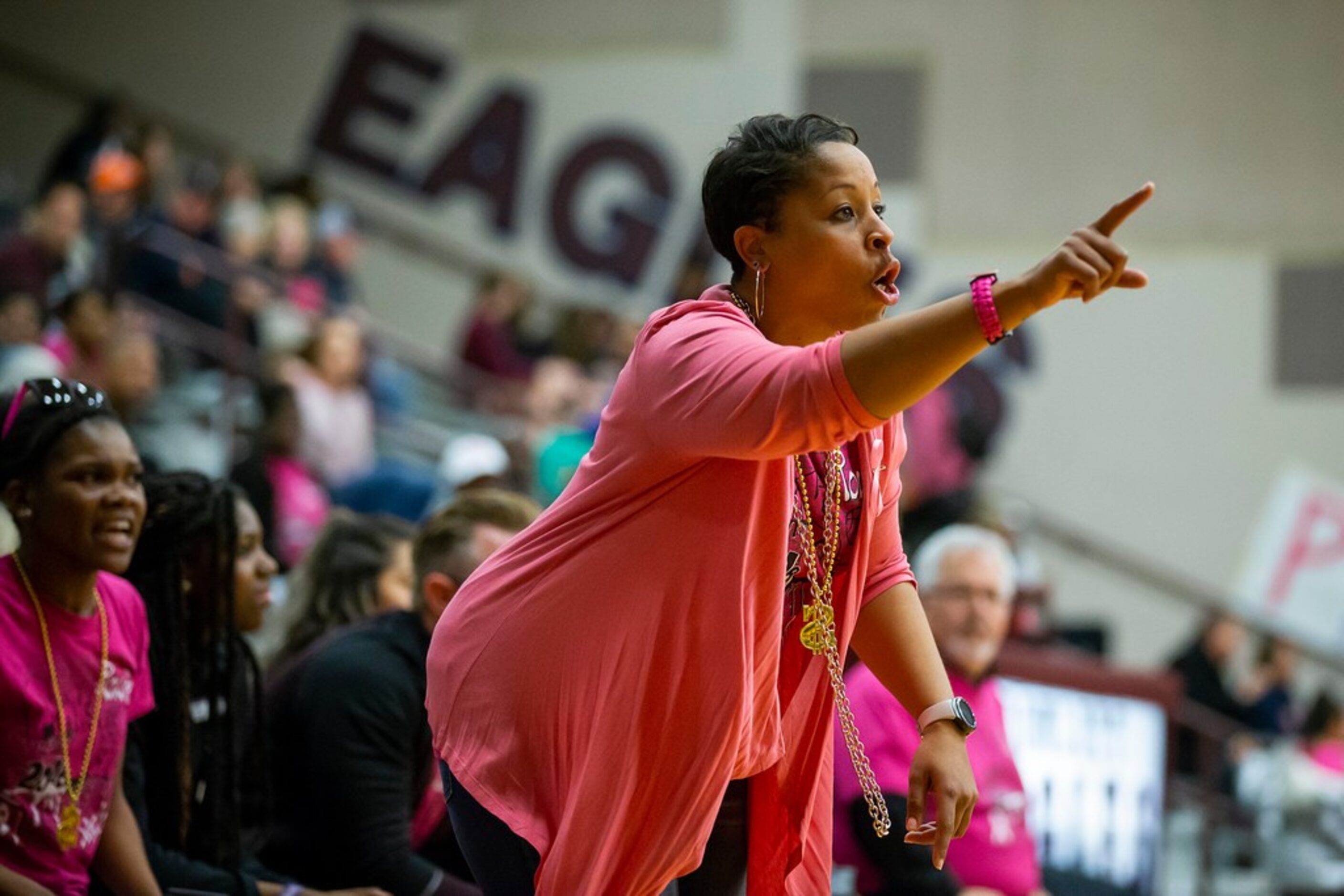 Rowlett head coach Alexis Hill directs her tem during a District 10-6A girls basketball game...