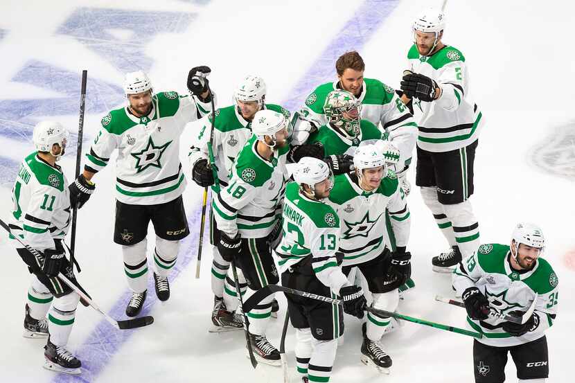 The Stars celebrate Corey Perry's game-winning goal against the Lightning in Game 5 of the...