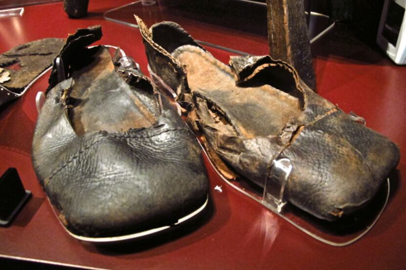 Remarkably, many leather objects, such as these shoes, survived more than four centuries in...