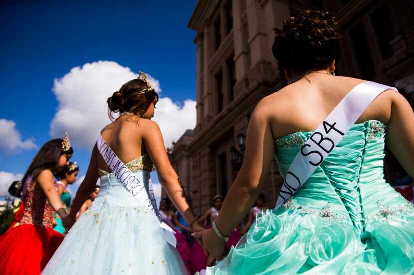 Teenage girls with Jolt Texas hold symbolic quinceaneras to protest the sanctuary cities ban...