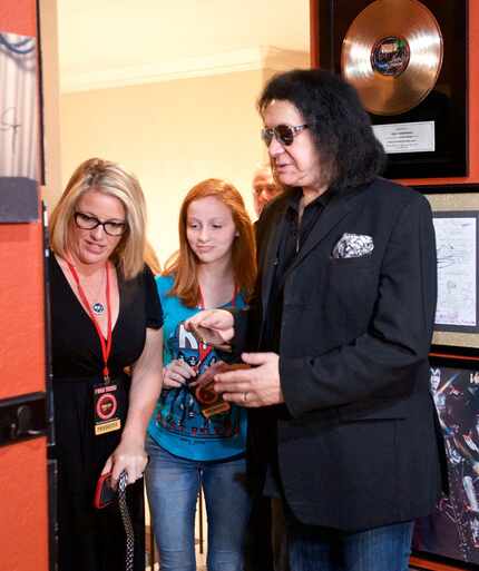 That's Sienna Hernandez, in the center: an 11-year-old KISS superfan from Frisco