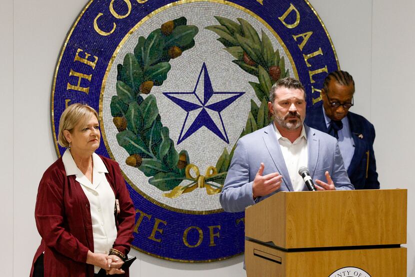 Dallas County Commissioner J.J. Koch speaks alongside commissioners Theresa Daniel (left)...