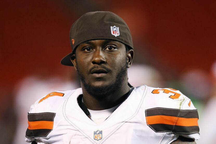 FILE - In this Aug. 13, 2015, file photo, Cleveland Browns running back Isaiah Crowell (34)...