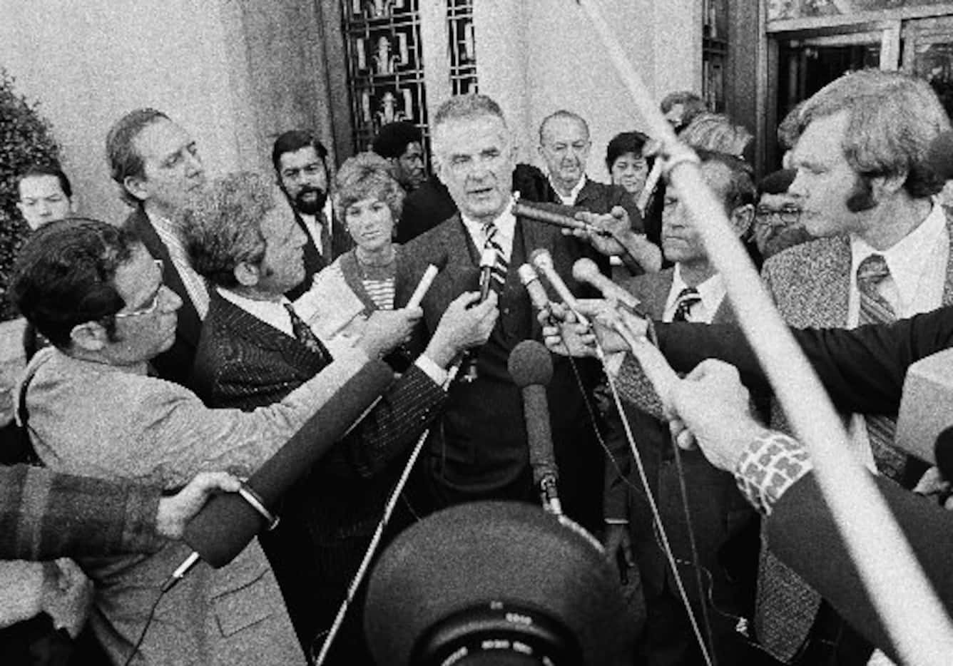 In this Oct. 19, 1973, file photo special Watergate prosecutor Archibald Cox talks to media...