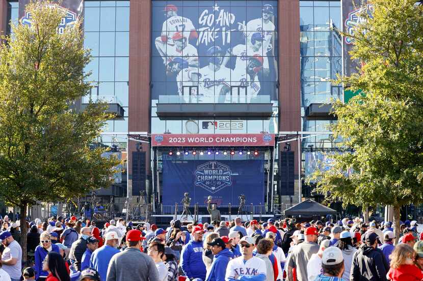 Fans gather outside Globe Life Field before the Texas Rangers World Series championship...