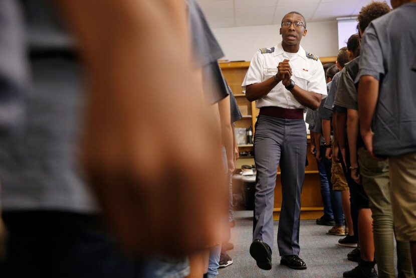 Cadet Lt. James Grays runs students through drills at a DISD stem camp on June 7 ,2017. ...