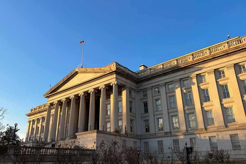 The Treasury Department is seen near sunset in Washington, Wednesday, Jan. 18, 2023. The...
