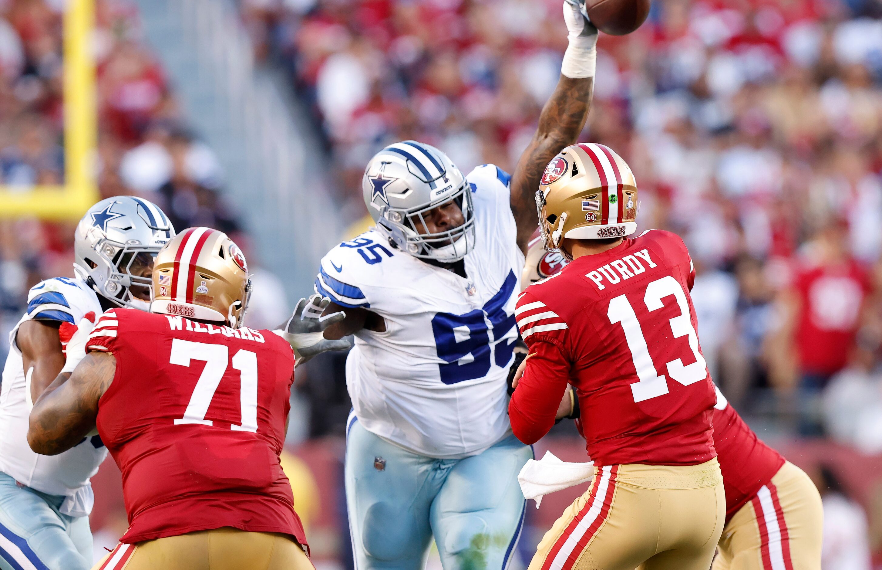 Dallas Cowboys defensive tackle Johnathan Hankins (95) tips a pass by San Francisco 49ers...