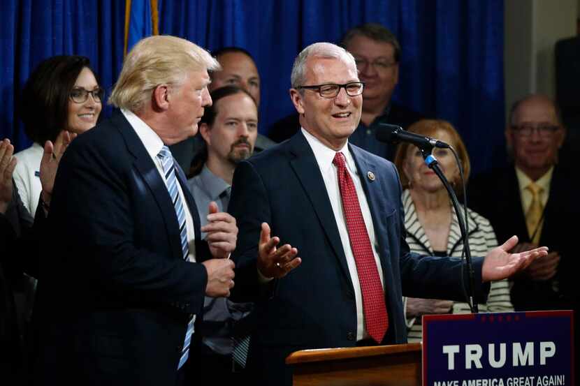 FILE - In this May 26, 2016 file photo, U.S. Rep. Kevin Cramer, R-N.D., right, talks about...