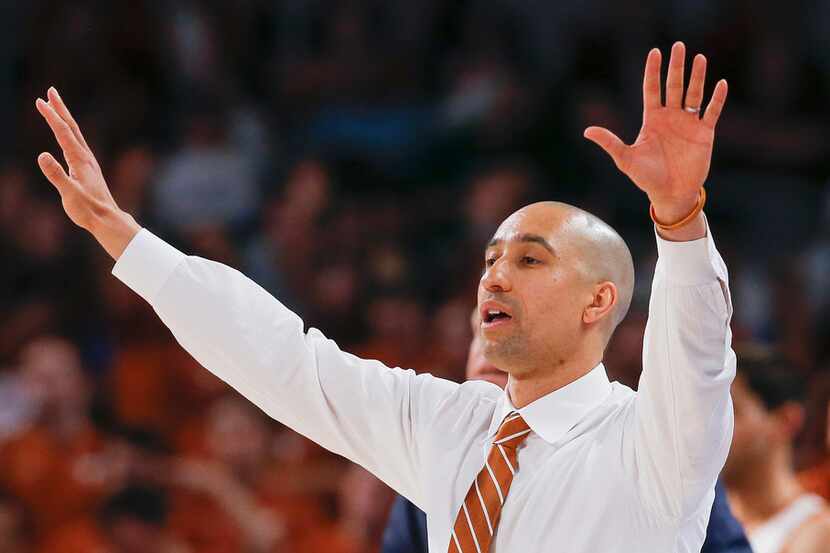Texas Longhorns head coach Shaka Smart works the sideline during the second half of a...