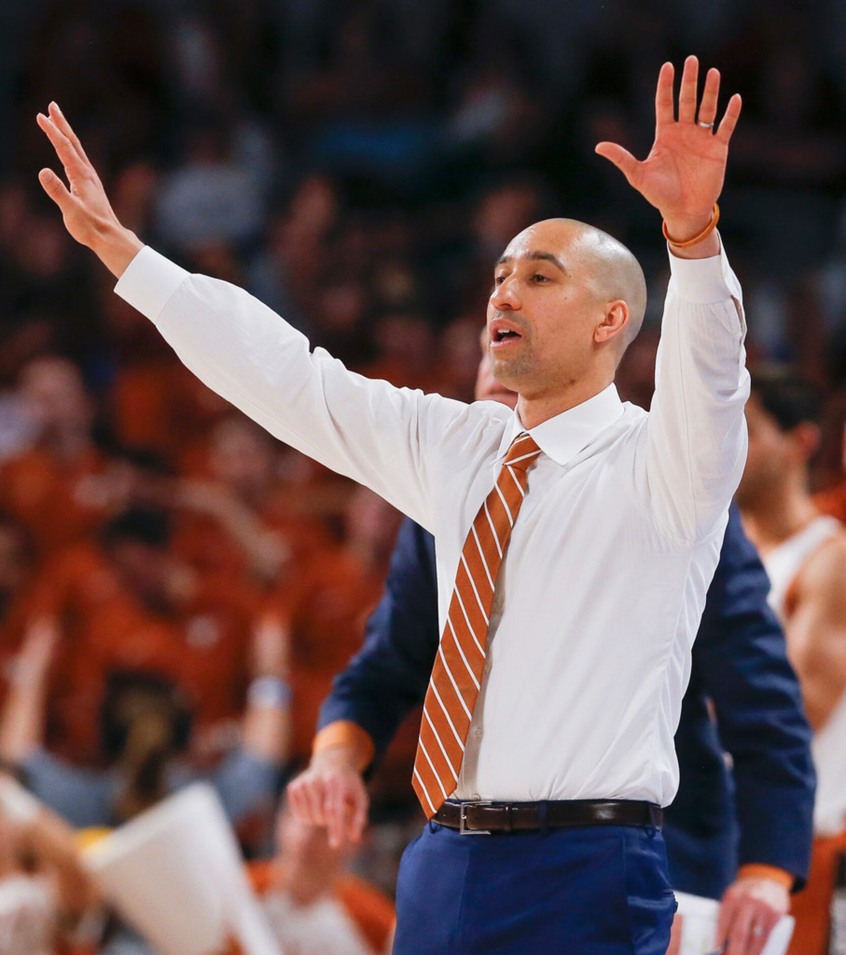 Texas Longhorns head coach Shaka Smart works the sideline during the second half of a...