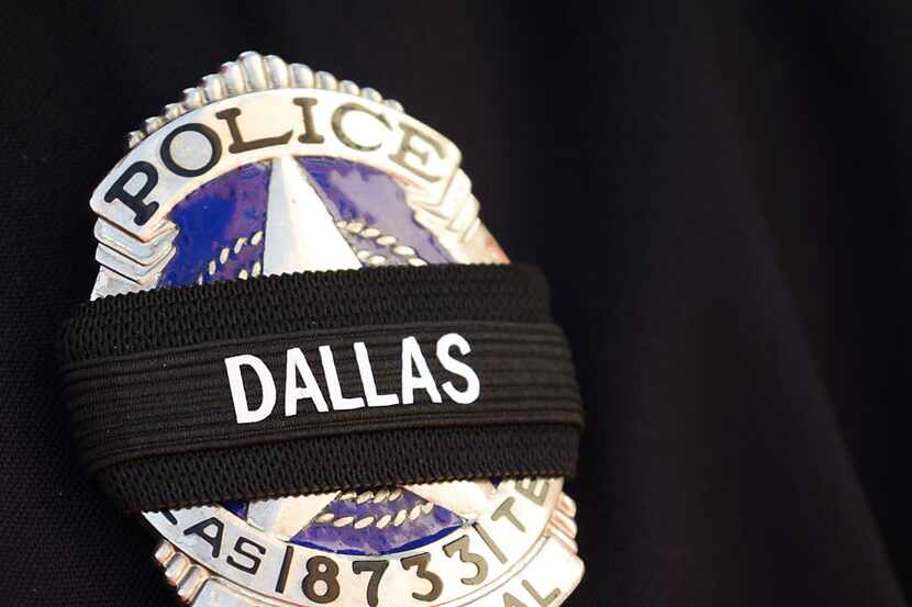 Dallas police honor the fallen from the July 7 downtown ambush. Four of their colleagues and...