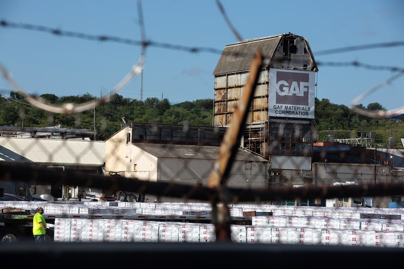 Residents of the neighborhood where the GAF plant operates are concerned about the potential...