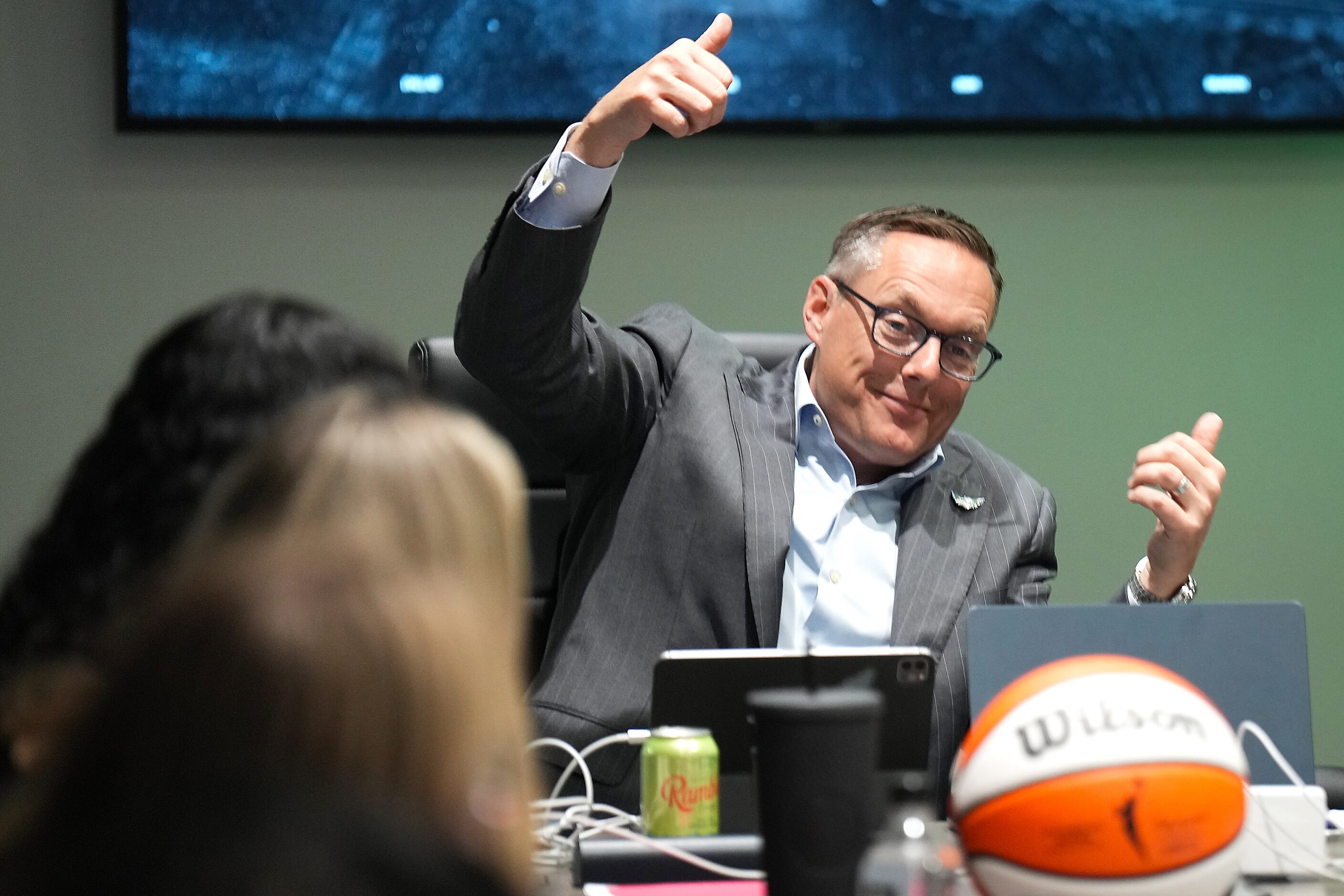 Dallas Wings President and CEO Greg Bibb reacts in the team’s draft war room during the 2024...