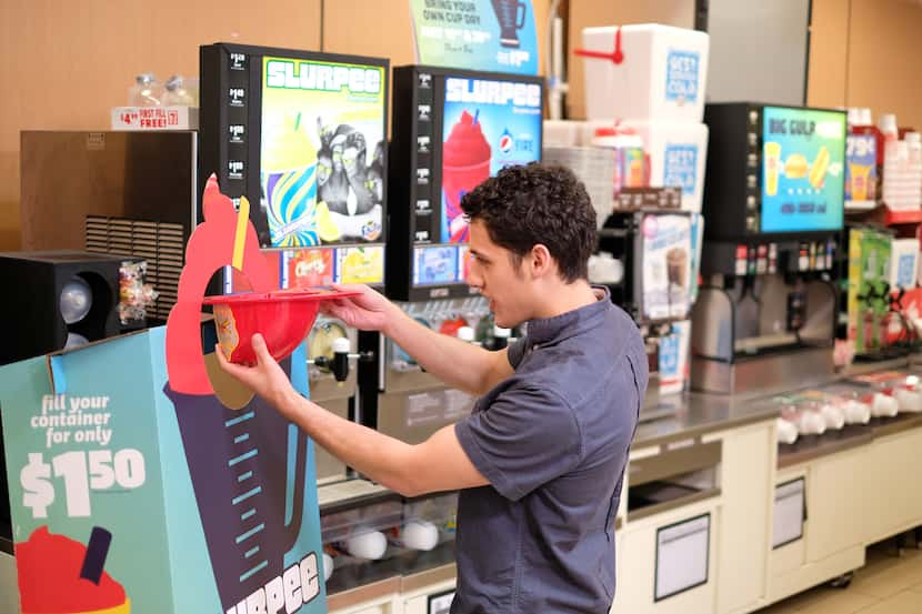 Yes, a child's plastic firefighter helmet is fair game as a Slurpee "cup." Just clean it...