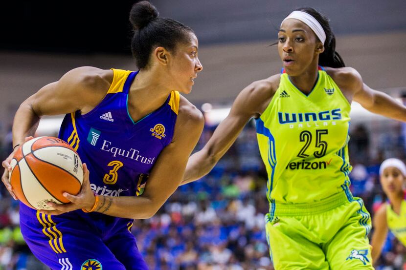 Dallas Wings forward Glory Johnson (25) goes for Los Angeles Sparks forward Candace Parker...