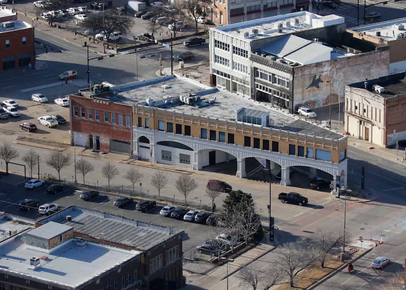 Todd Interests has completed its purchase of almost two dozen old buildings on downtown...
