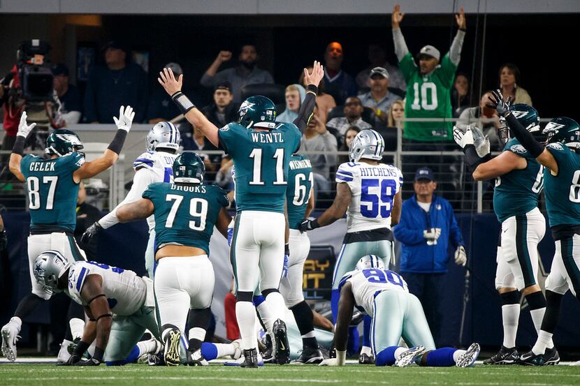 Philadelphia Eagles quarterback Carson Wentz (11) celebrates a touchdown during the first...