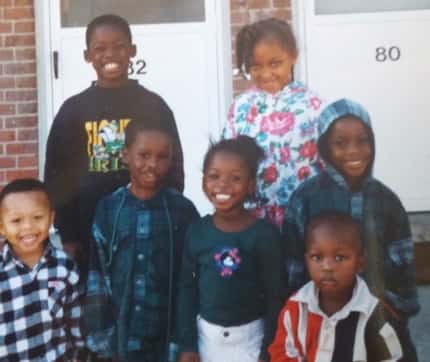 A photo of Dorian Finney-Smith's family and friends from childhood. Top row are...