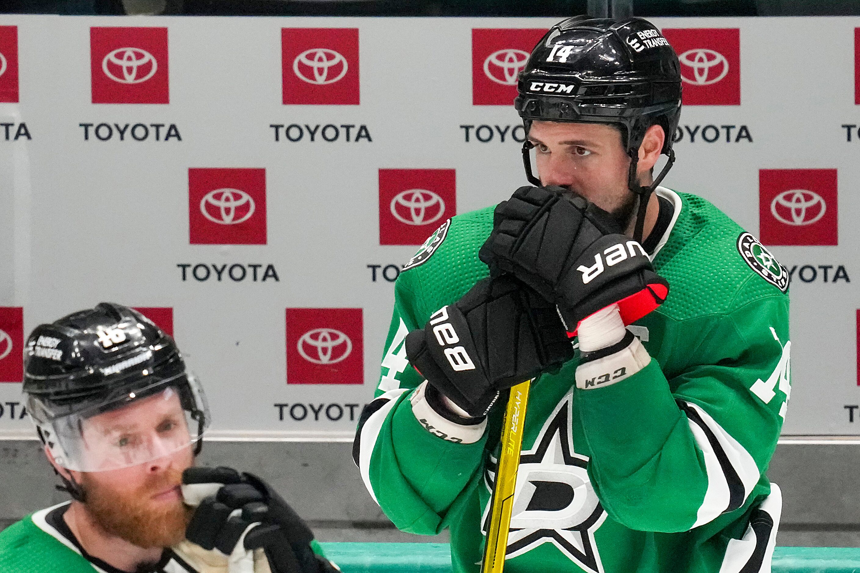 Dallas Stars left wing Jamie Benn (14) and center Joe Pavelski (16) look out onto the ice...