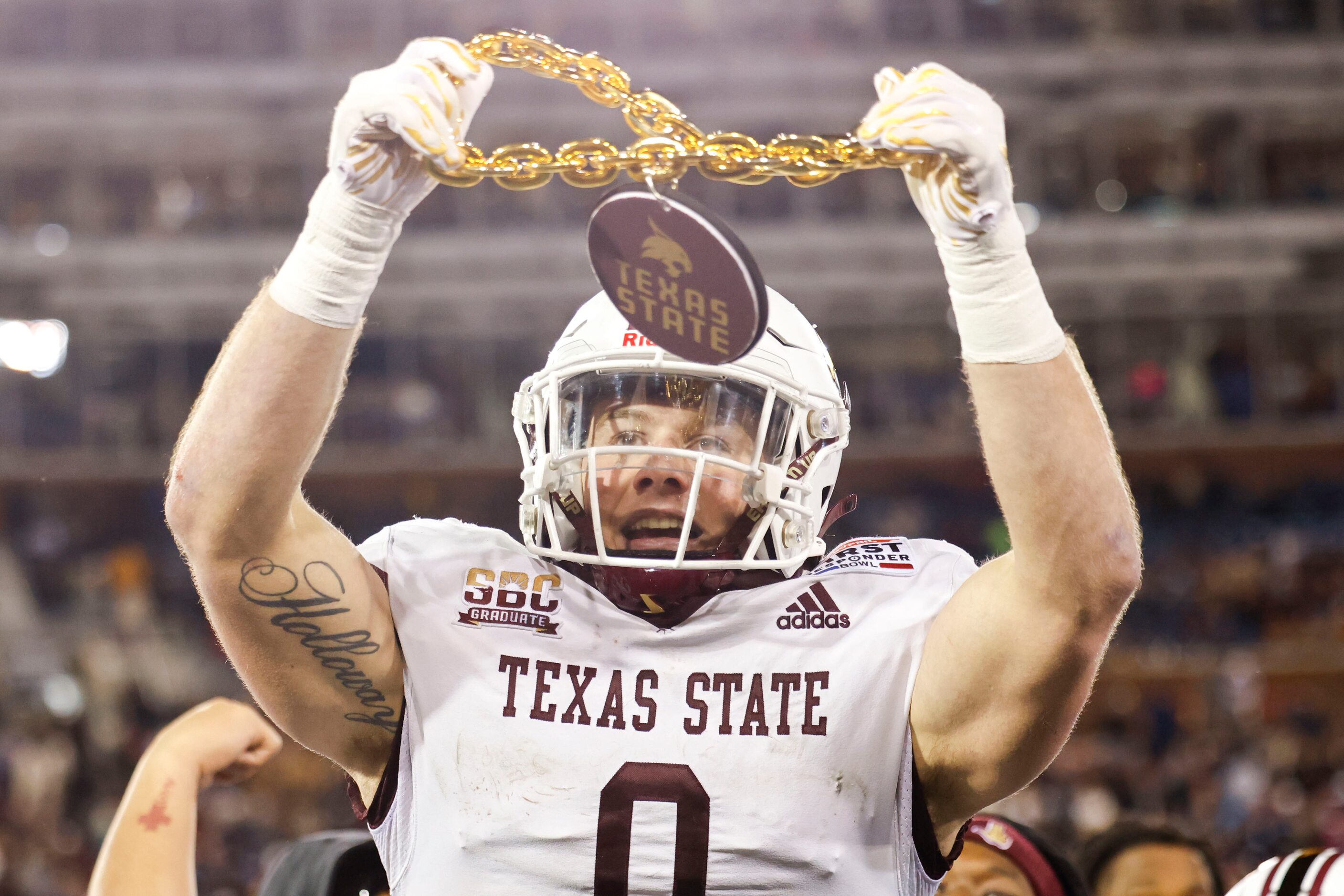 Texas State linebacker Brian Holloway (0) celebrates his second pick six against the Rice...