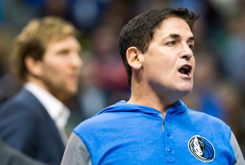 Dallas Mavericks owner Mark Cuban yells toward the referees during the first half of an NBA...