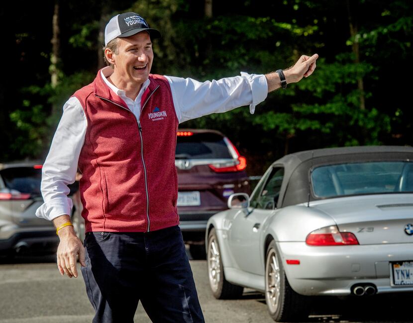 Glenn Youngkin worked a line of cars during the Virginia Republican primary in May.