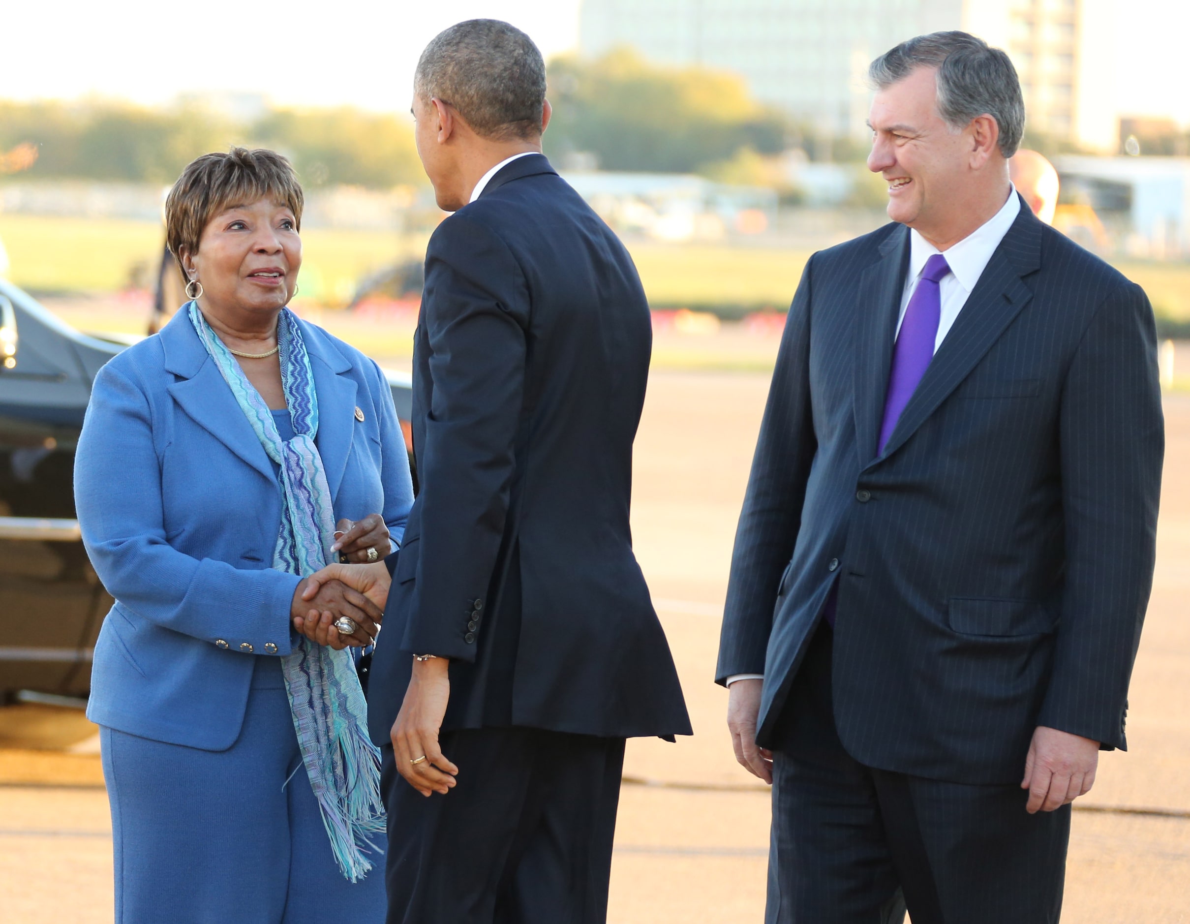 U.S. Representative Eddie Bernice Johnson greets President Barack Obama alongside Dallas...