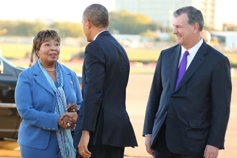 U.S. Representative Eddie Bernice Johnson greets President Barack Obama alongside Dallas...