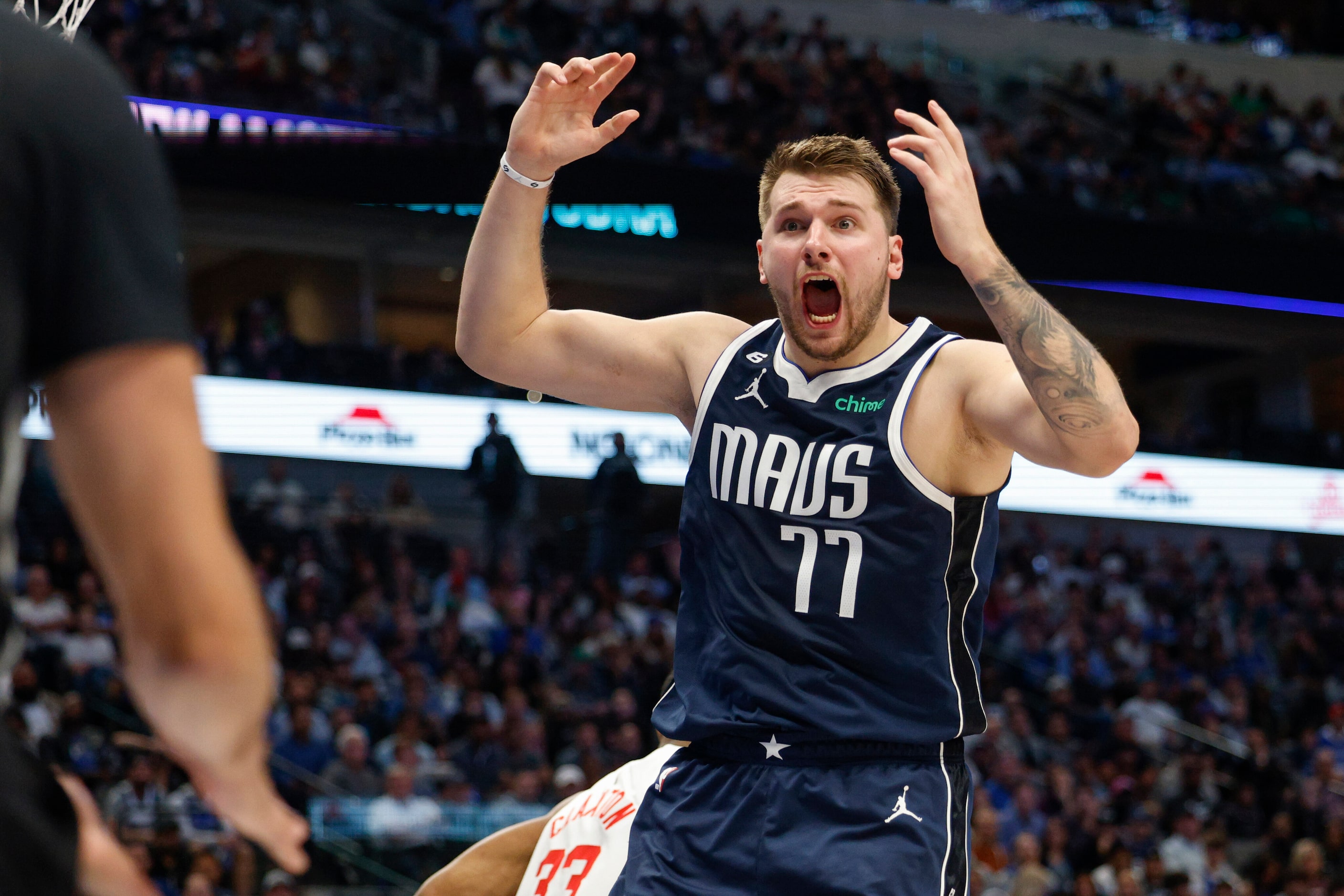 Dallas Mavericks guard Luka Doncic (77) reacts after non-foul call during the first half of...