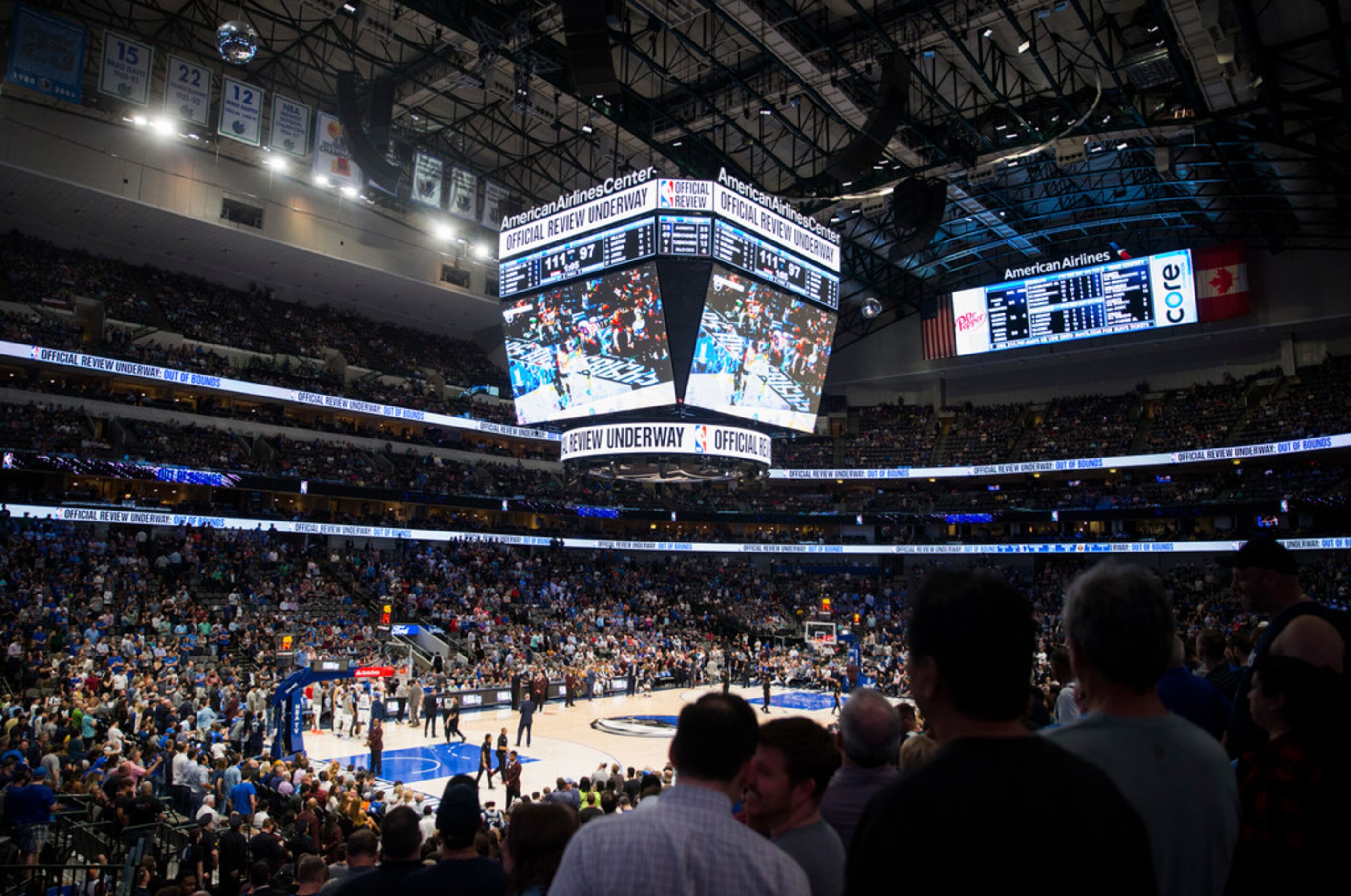 A mostly full arena in the fourth quarter of an NBA game between the Dallas Mavericks and...