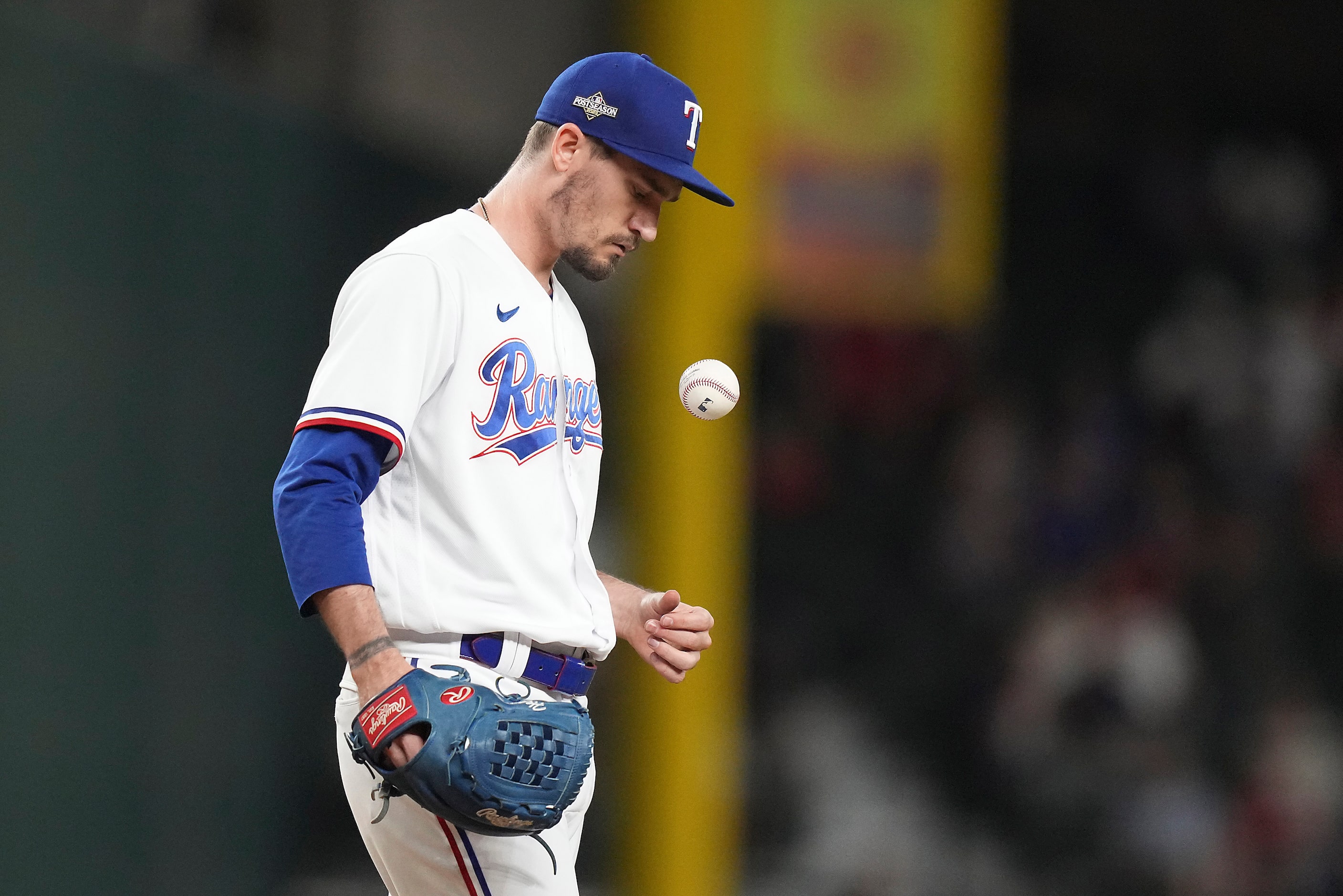 Texas Rangers pitcher Andrew Heaney reacts after a single by Houston Astros designated...