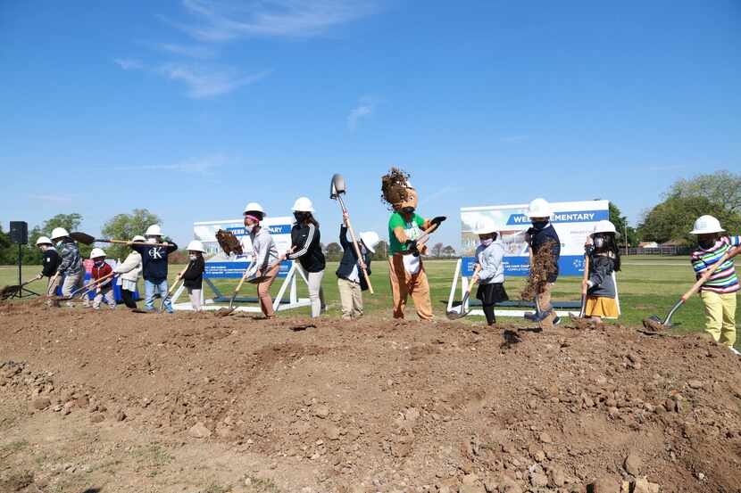 Students at Webb Elementary participated in a ceremonial groundbreaking for their new school...