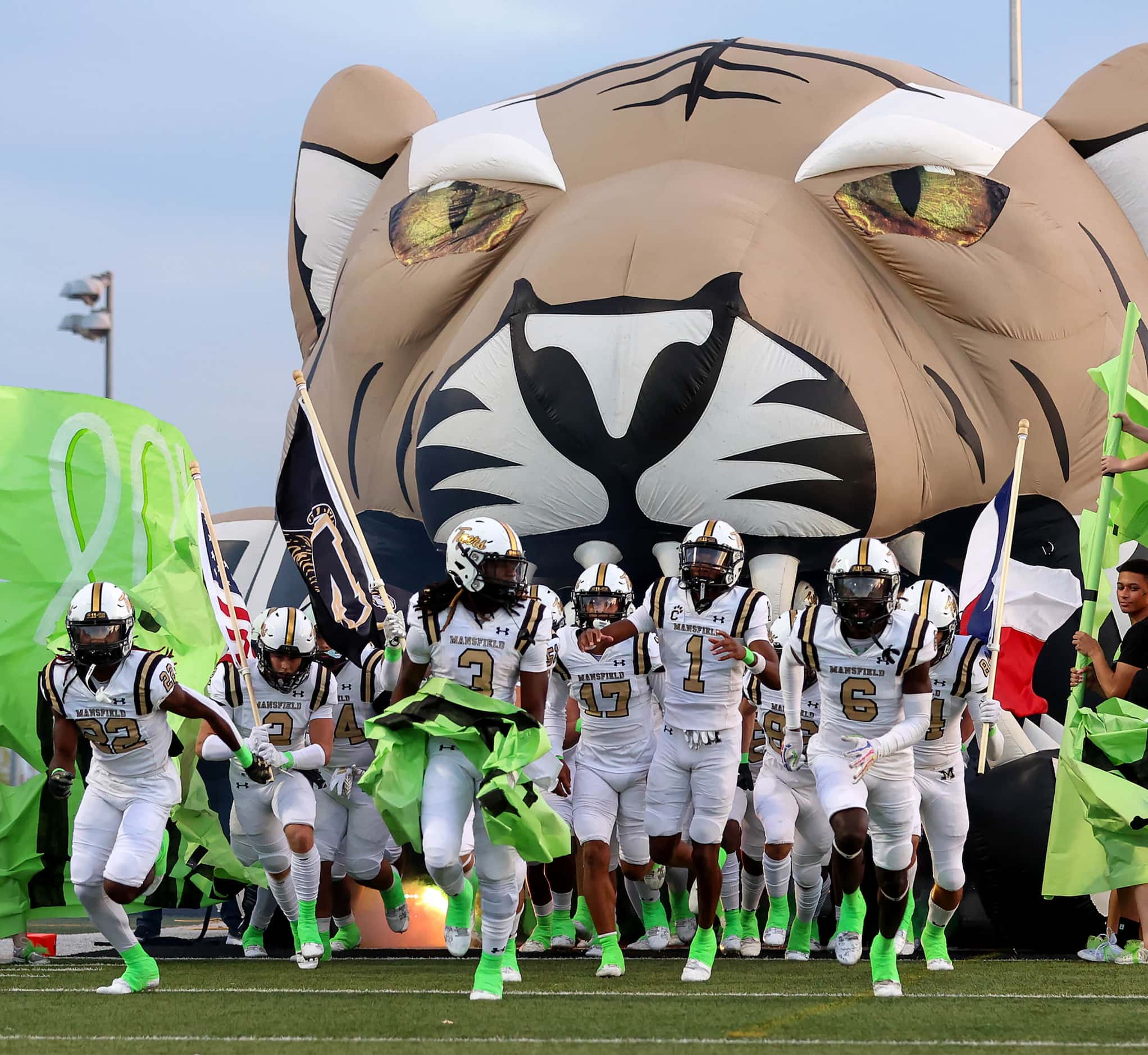 The Mansfield Tigers enter the field to face Cedar Hill in a District 11-6A high school...