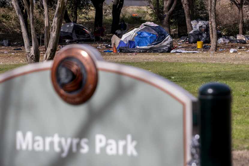 Homeless encampments lined the far side of Martyrs Park in Downtown Dallas on Wednesday. The...