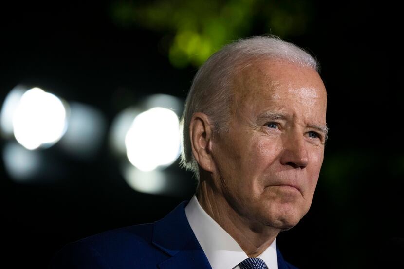 President Joe Biden listens to a question as he speaks during a media availability on the...