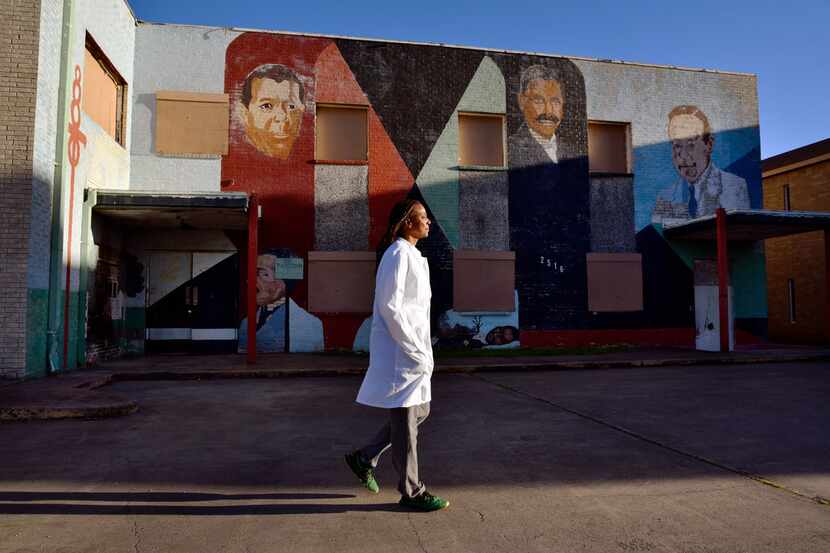 Dr. Michelle Morgan, founder of the Art of Dentistry, outside of an abandoned building she...