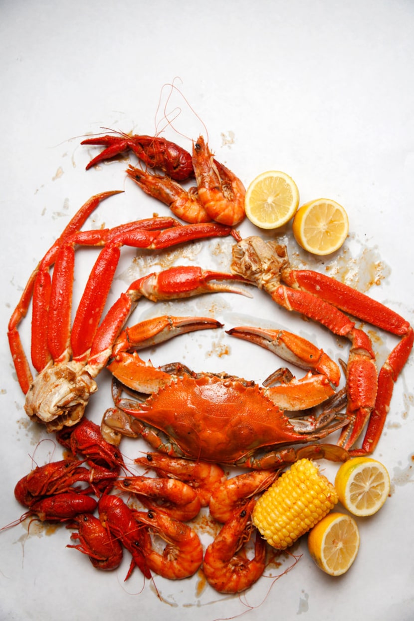 A blue crab, snow crab legs, crawfish and shrimp from The Boiling Crab.