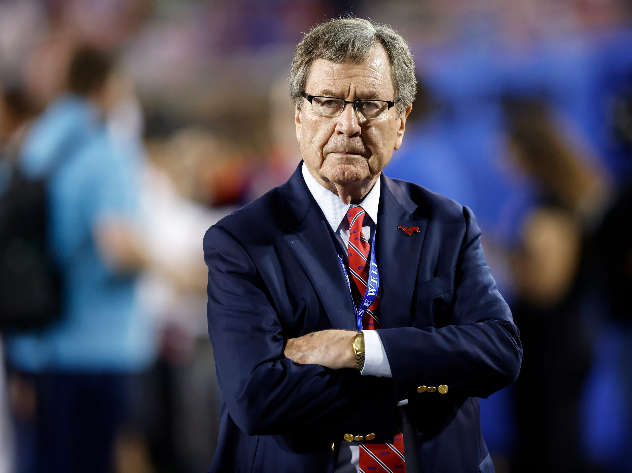 SMU president Gerald Turner watches the Mustngs face the Navy Midshipmen during the fourth...