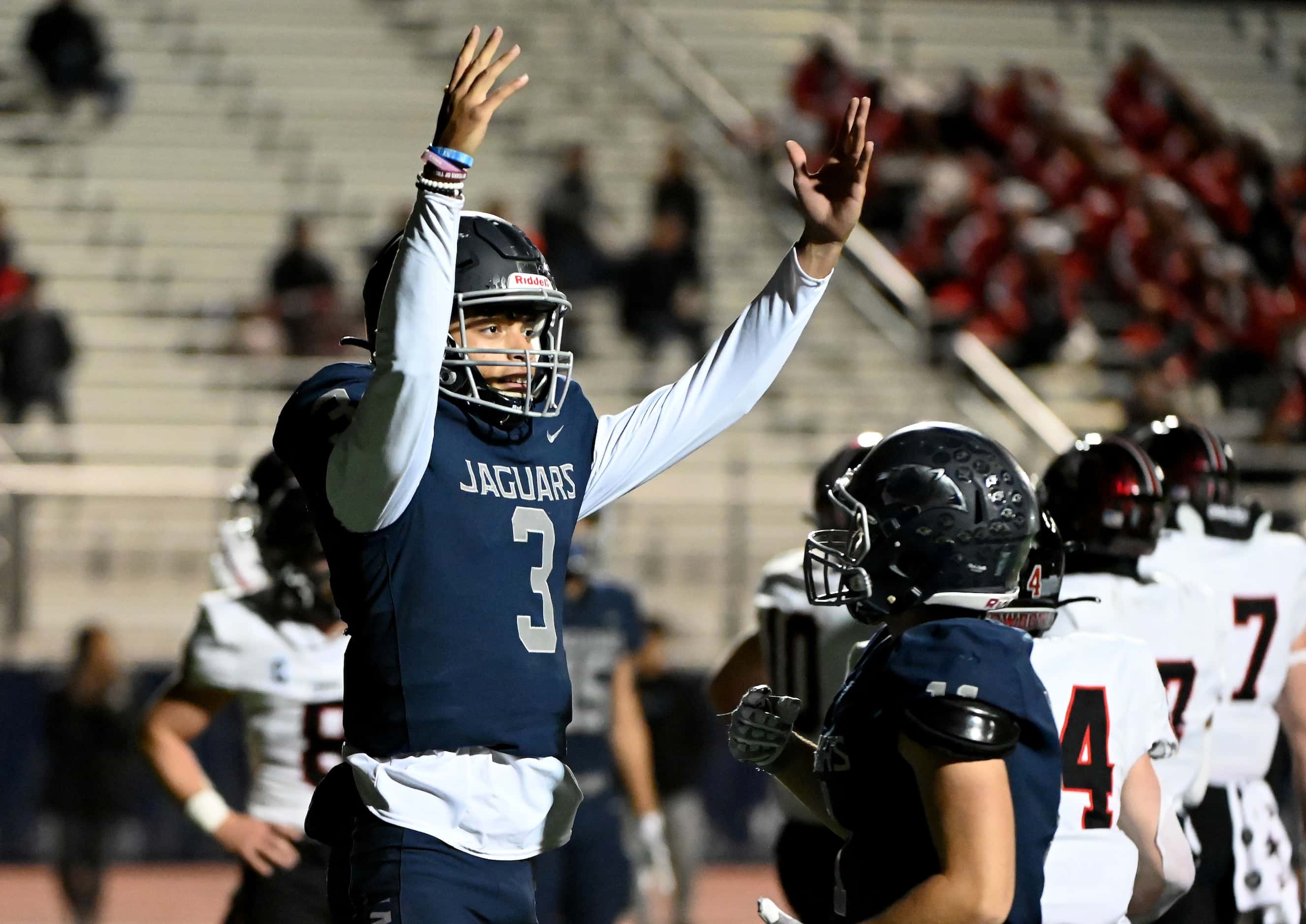 Flower Mound quarterback Nick Evers (3) celebrates after his touchdown run in the second...