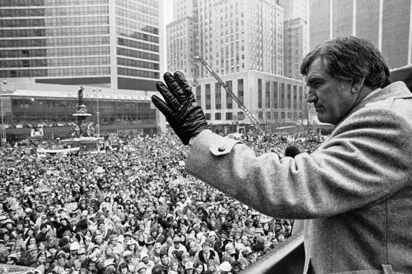 FILE - In this Jan. 25, 1982, file photo, Cincinnati Bengals head coach Forrest Gregg waves...