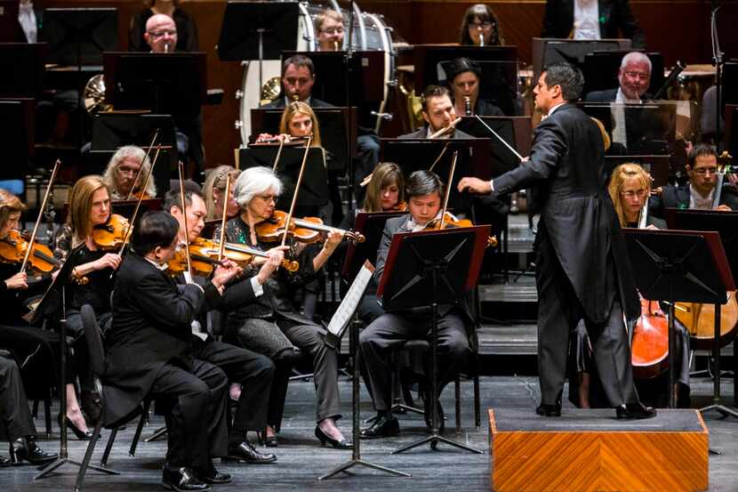 Music director Miguel Harth-Bedoya, right, conducts the Fort Worth Symphony Orchestra on...
