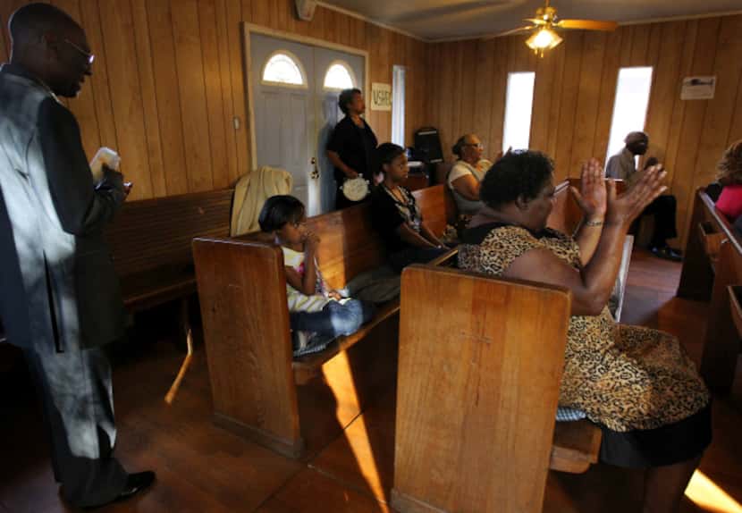 The Shanks family attends church in the house where David Shanks was raised, which is across...