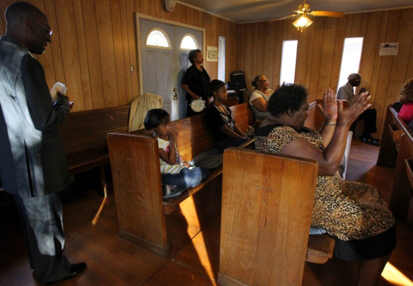 The Shanks family attends church in the house where David Shanks was raised, which is across...