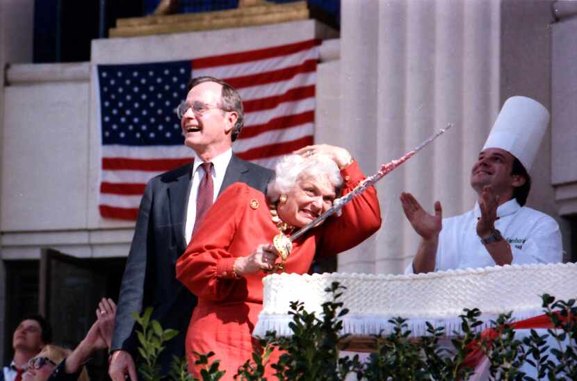 1986: Vice President George Bush laughs as his wife, Barbara, offers a startled reaction to...
