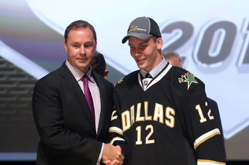 Stars general manager Joe Nieuwendyk (left) with Dallas' 2012 first-round NHL draft pick...