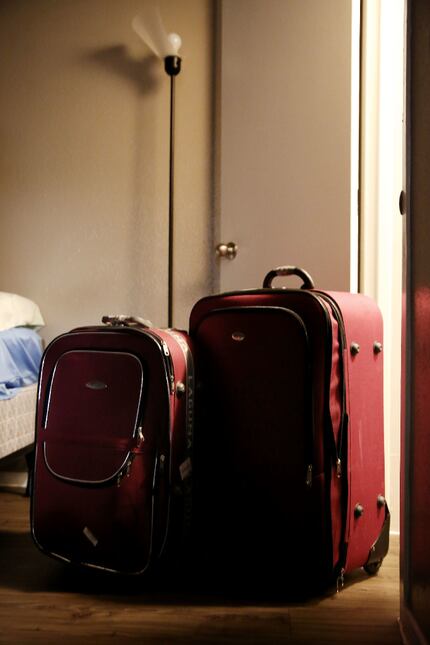 Suitcases belonging to the Jawish brothers' parents stand -- still packed -- in the corner...