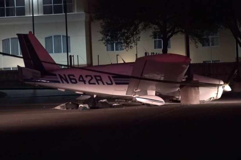 A small plane reported that it was losing fuel over Dallas and landed in a parking lot near...